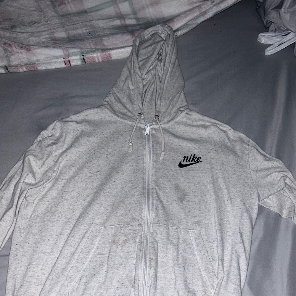 It is a thin Nike jacket